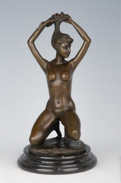 Picture of Nude Girl Holding Hair Figurine